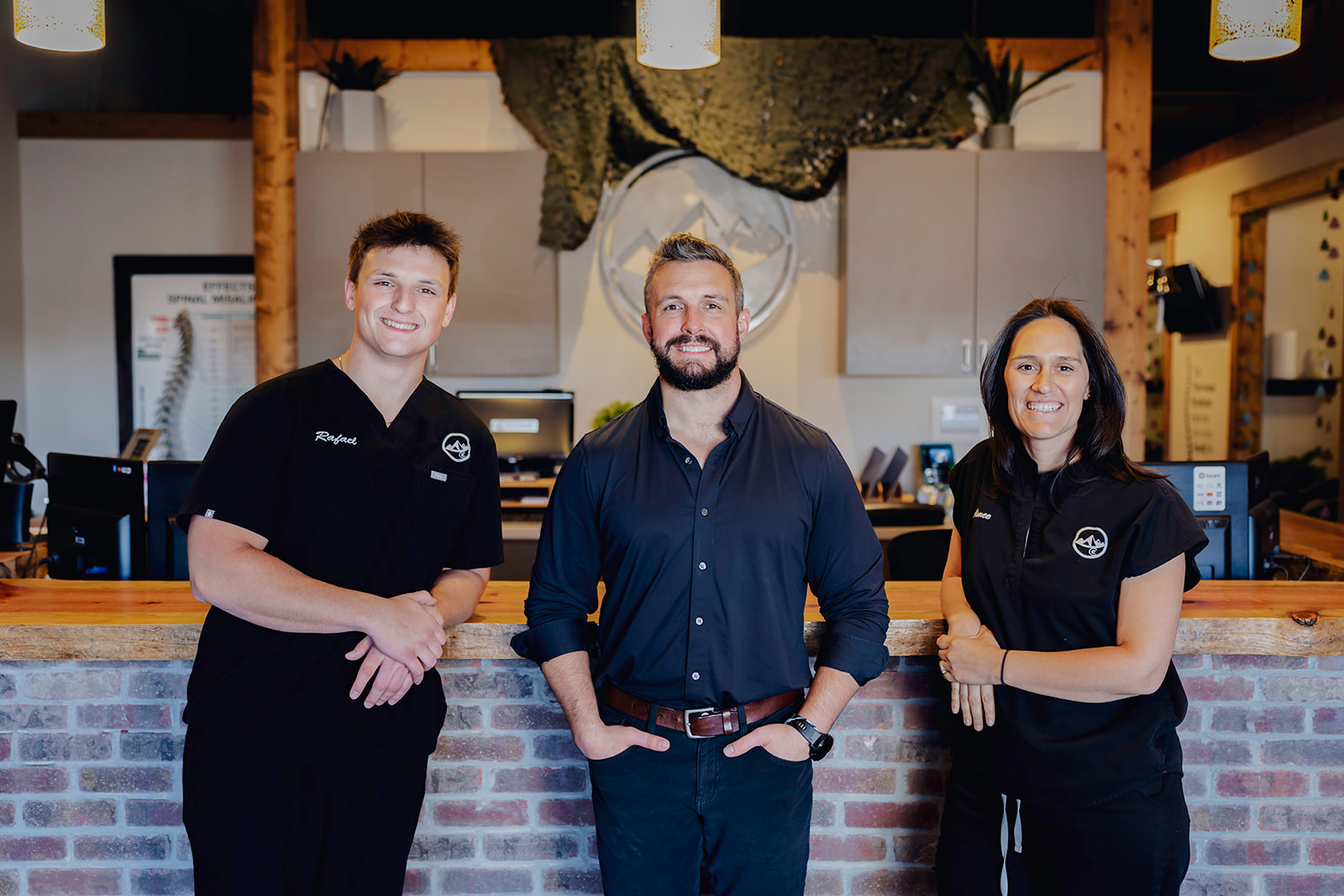 Elevate chiropractic team at the front desk